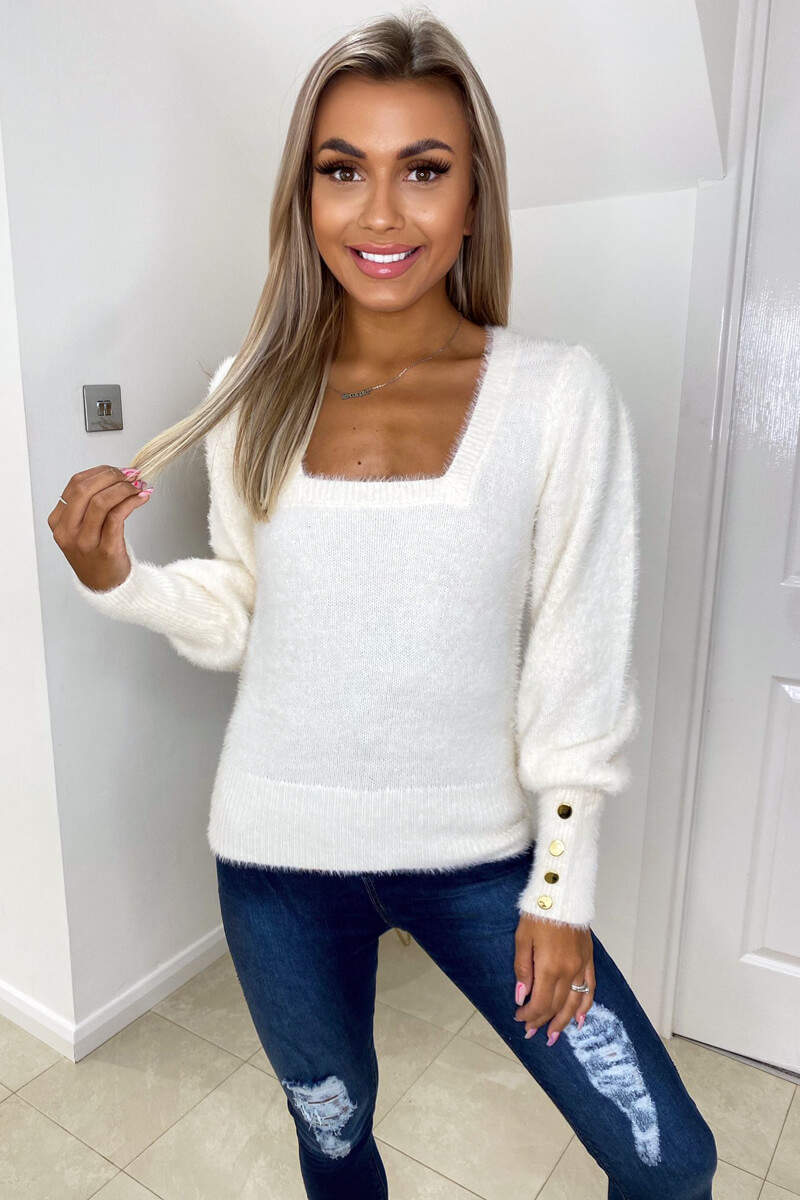 Fluffy cream jumper sales