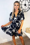 Navy Marble Print Wrap Over Pleated Dress