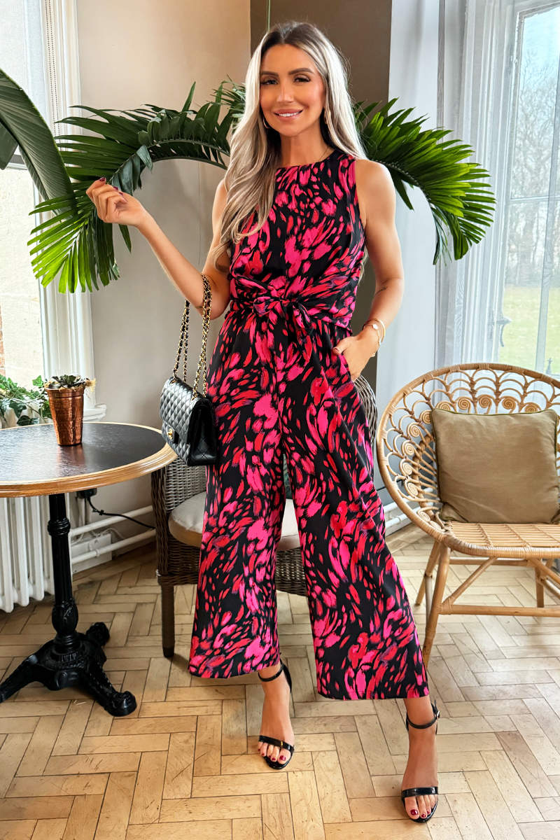 Pink And Black Printed Sleeveless Knot Front Jumpsuit