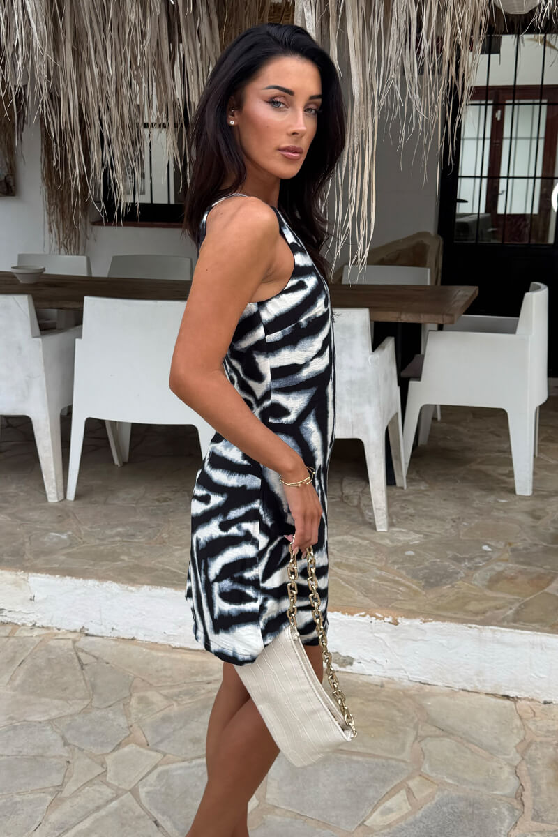 AX Paris Women's Black & White Animal Print Racer Neck Slip Mini 8 AX Paris Women's Black & White Animal Print Racer Neck Slip Mini 8