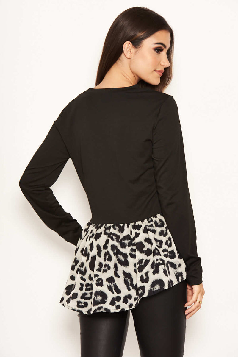 Long Sleeved Animal Print Peplum Top